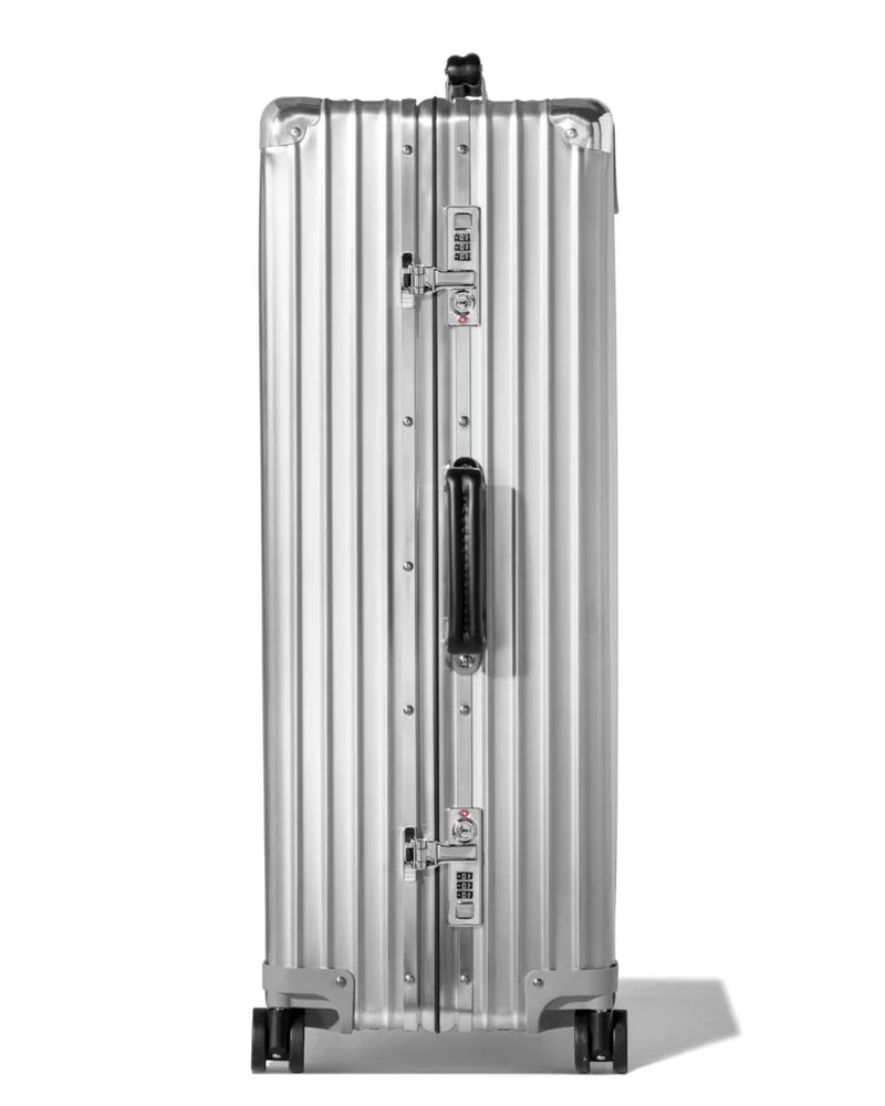 Large check-in aluminium suitcase in silver, side view