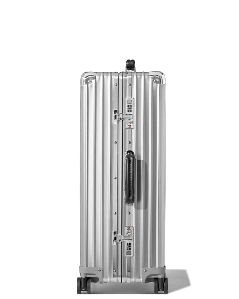 Medium check-in aluminium suitcase in silver, side view